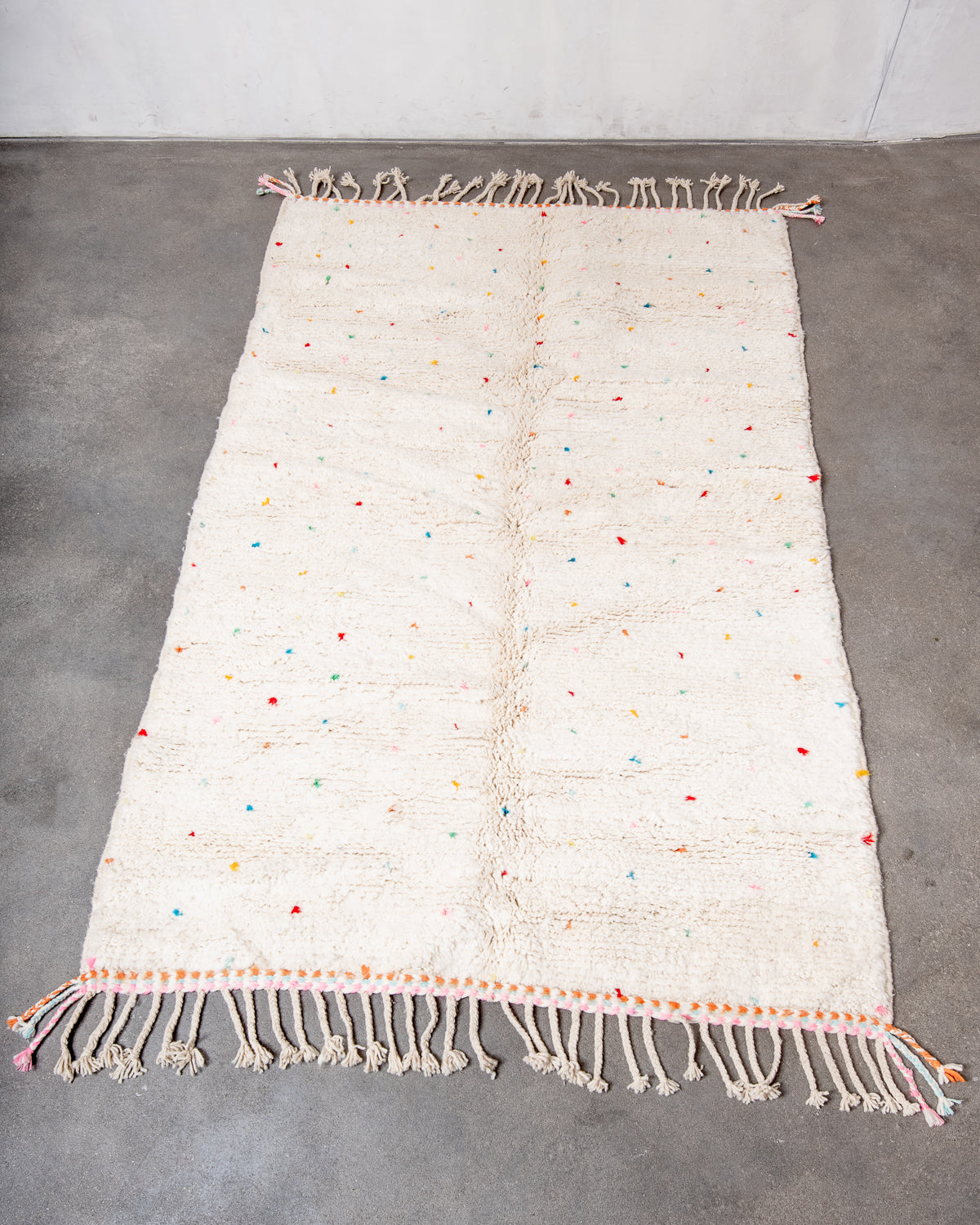 Modern, designer, handcrafted Berber rug from Morocco. Beniourain carpet with beautiful colours and patterns and fluffy wool texture.